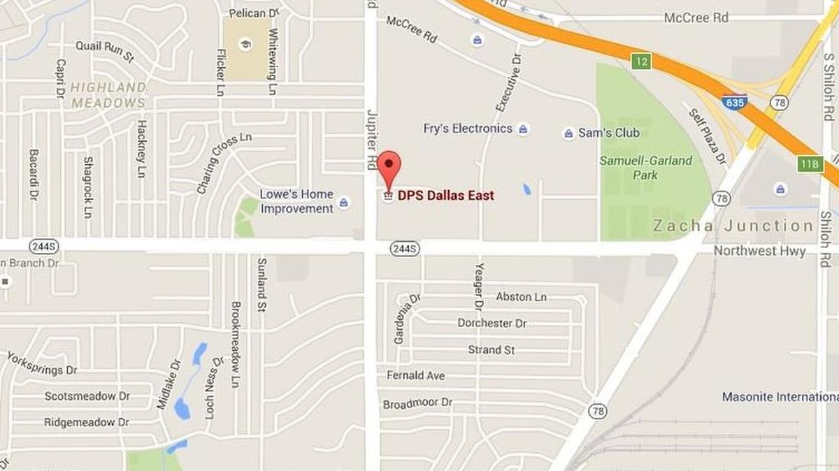 A man is in custody after an officer-involved shooting Wednesday outside a Dallas DPS office