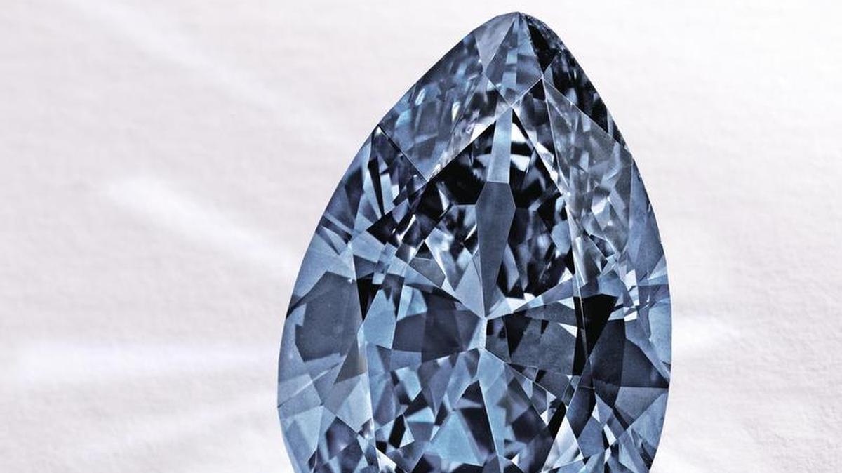 Archived photo of blue pear shaped diamond. Two north Texas men were sentenced to prison on Thursday for their roles in a diamond investment scheme designed to defraud investors out of more than $6.4 million.