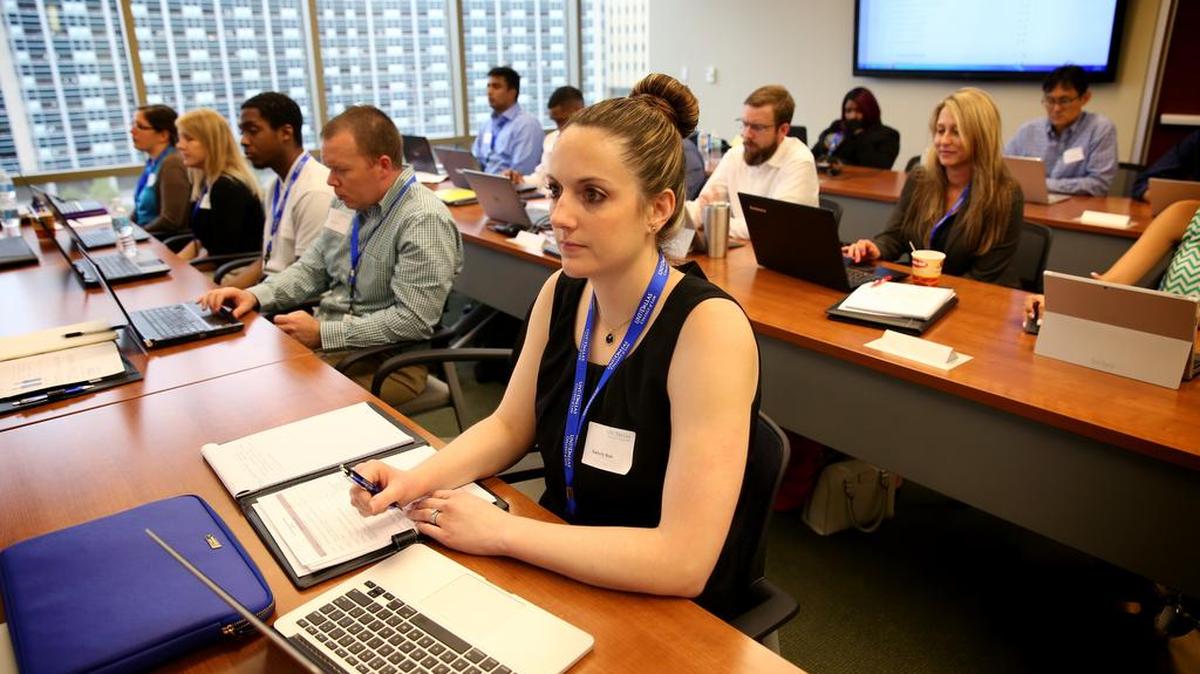 First-year law student Kimberly Hale listens during a lecture at the UNT Dallas College of Law in Dallas. Officials at the University of North Texas-Dallas College of Law tried something different. They welcomed a diverse group of students, many with grit but not the grades or test scores to get into top law schools.