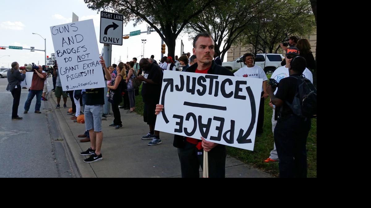 
Protesters organized by Mothers Against Police Brutality gathered in front of the Frank Crowley Criminal Courts building in Dallas on Friday, May 1. 
