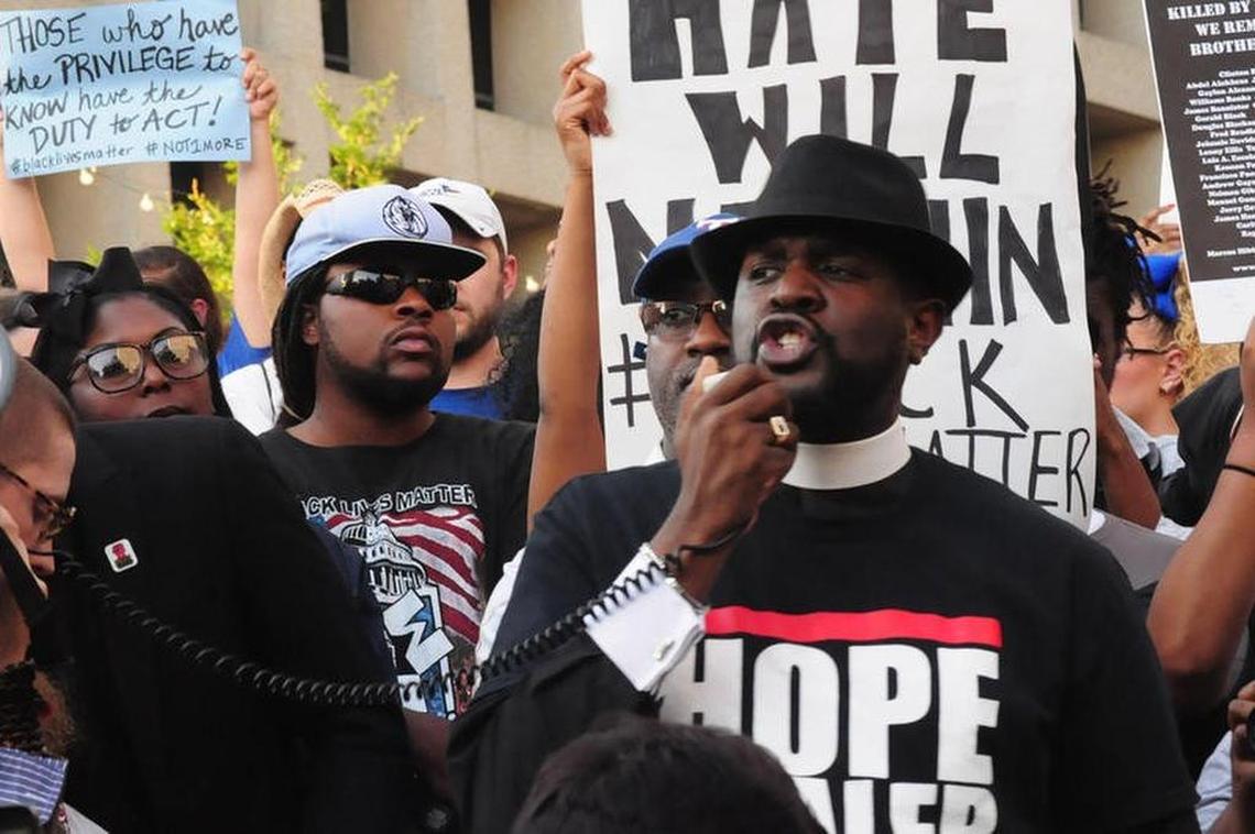 Pastor Michael Waters protests police shootings across the country in downtown Dallas on July 7, 2016. The peaceful protest concluded with a lone gunman killing five Dallas police officers.