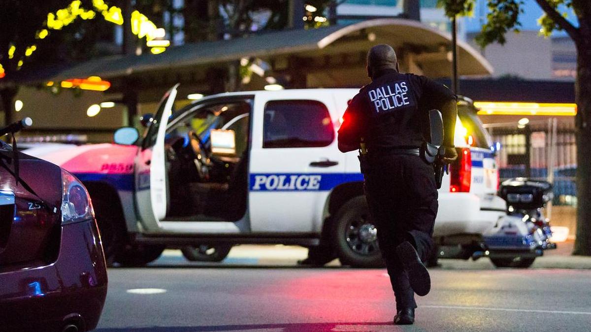 Dallas Police respond after shots were fired at a Black Lives Matter rally in downtown Dallas on Thursday, July 7, 2016.