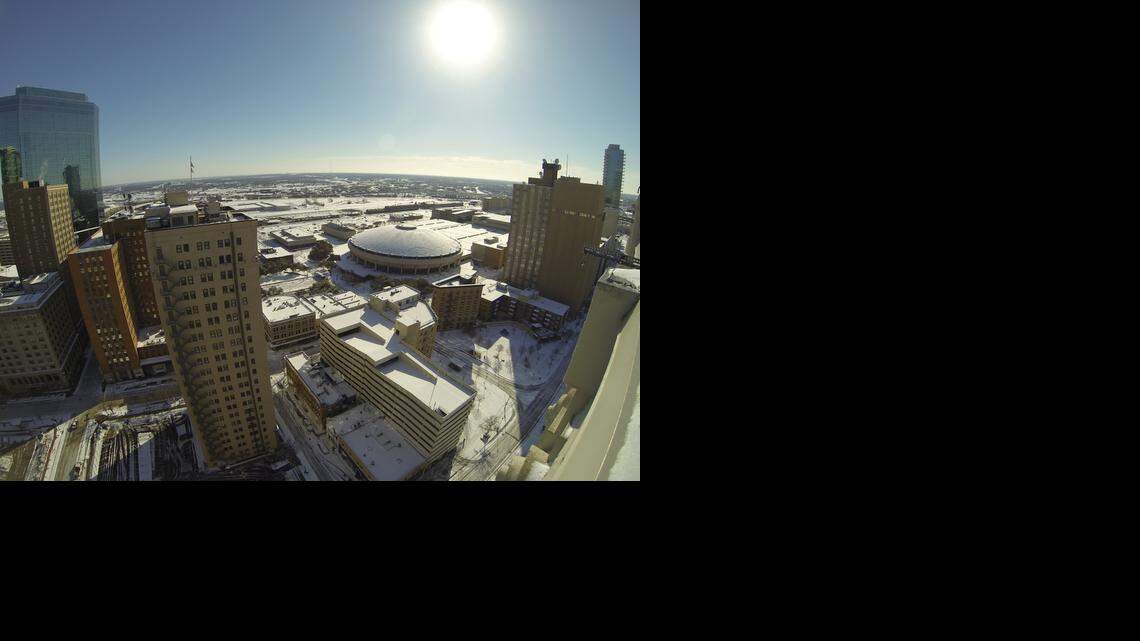 
Downtown Fort Worth rooftops were glistening under a layer of snow and sleet.
