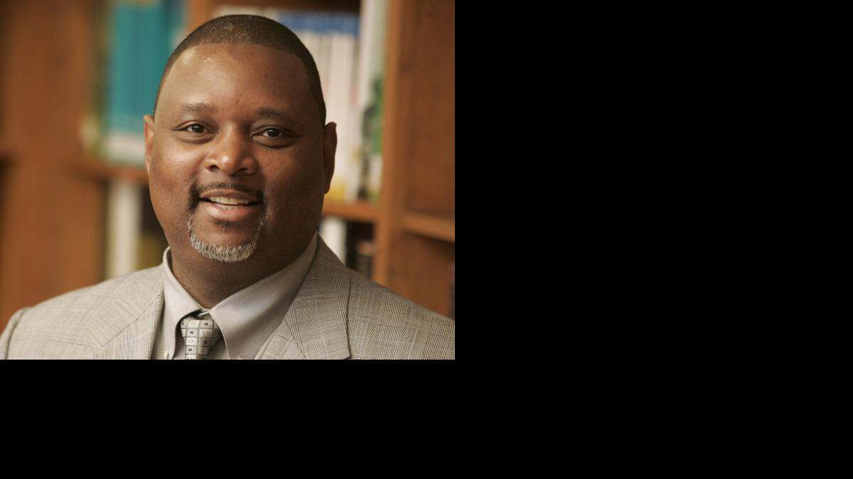 Curtis Amos, in 2015, died Saturday after a three-year battle with cancer, the Everman school district said. The Everman superintendent helped implement key programs in the school district during his tenure.