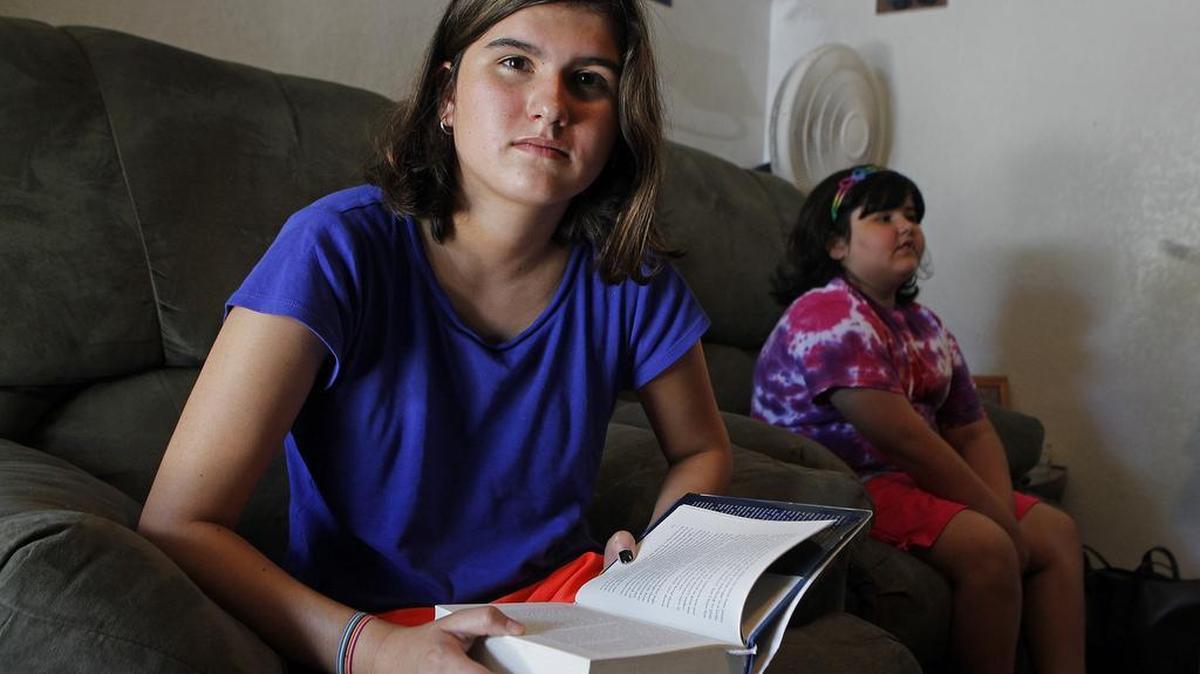 Ellie Martinez, 12, and her sister Katie Martinez, 8, have been diagnosed with dyslexia but have found success with the help of Fort Worth school district programs.
