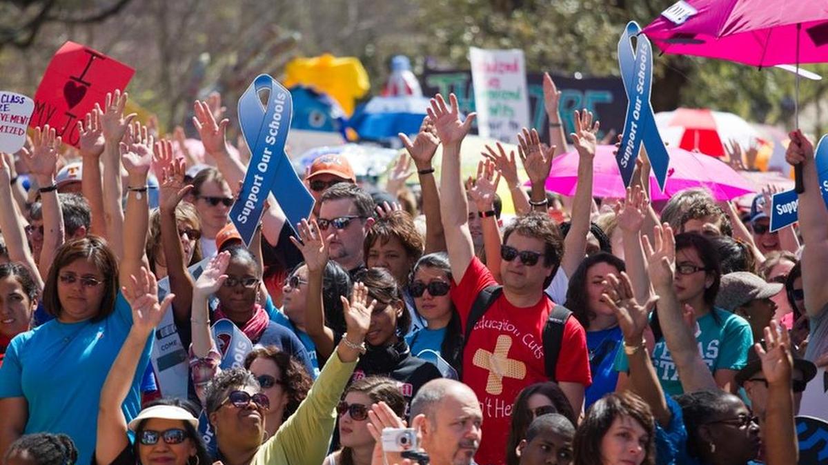 Thousands of students, teachers, educators and parents march through the streets of Austin and rally at the Texas Capitol protesting education budget cuts they say will do long-term harm to Texas students.