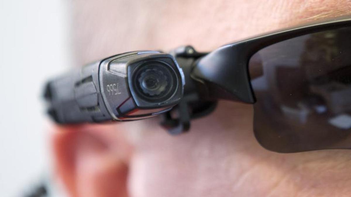 Body cameras worn by Fort Worth police disputed what an officer had stated regarding a gun in a glove box.