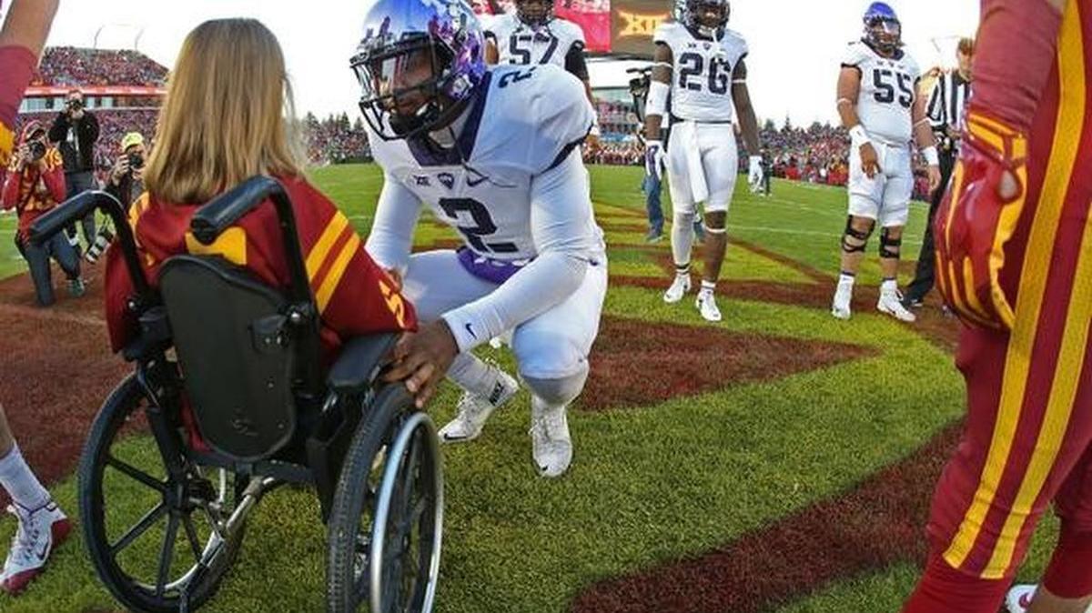 This photo of TCU quarterback Trevone Boykin with an Iowa State fan before Saturday’s game has gone viral
