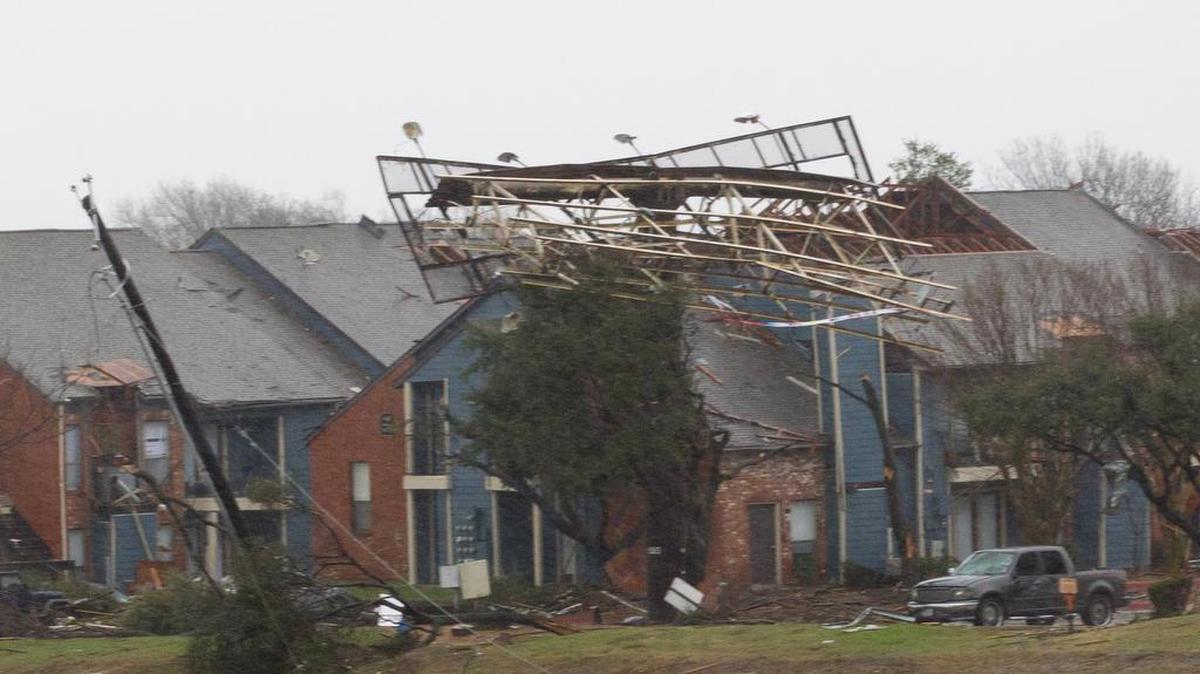 Damage from a tornado in Garland is visible from Interstate 30 on December 28.