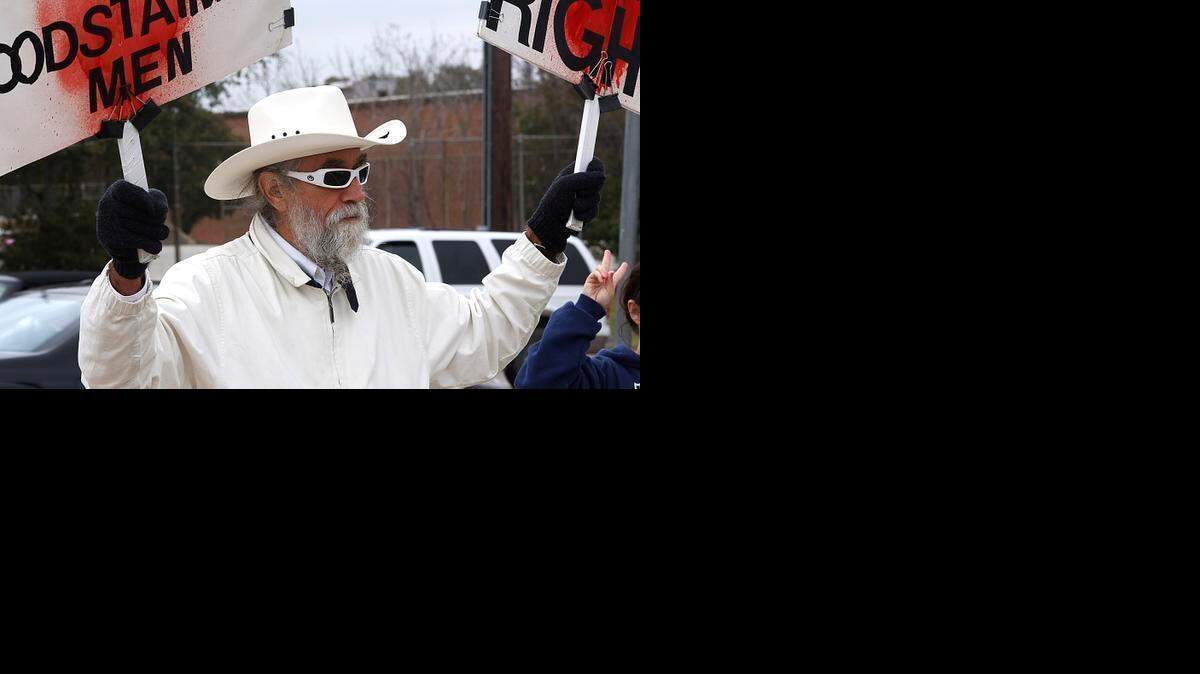 
Brother K demonstrates for Bloodstainedmen.org at Hulen and I-30 Sunday in Fort Worth. He leads a group against male circumcision.
