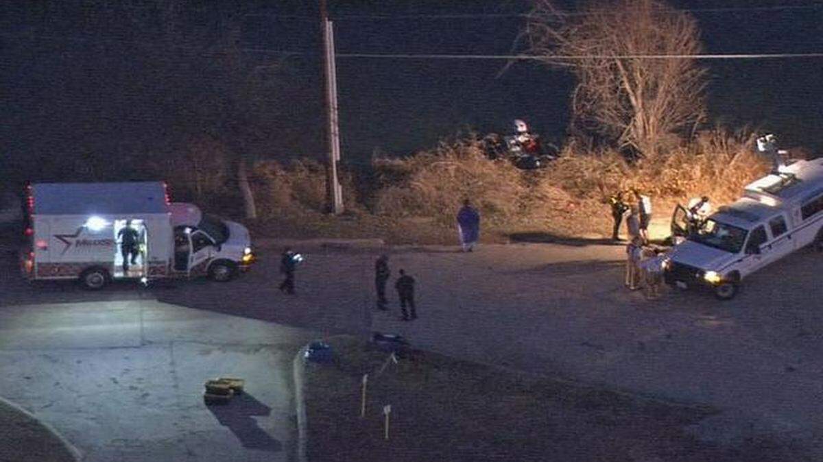 
Divers with the Fort Worth Fire Department pulled a body out of a pickup in a lake off East Loop 820 Tuesday night. 
