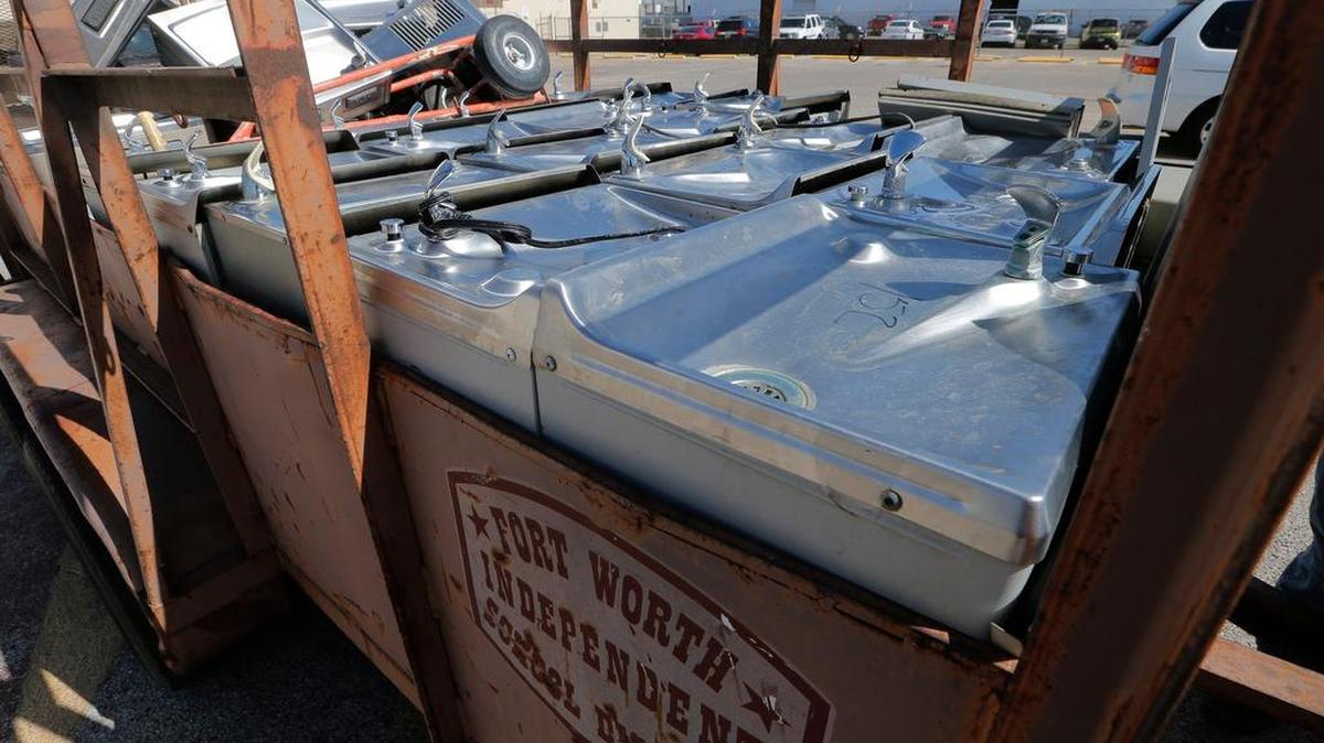 A trailer loaded with water fountains from several schools in the Fort Worth school district that were removed for safety reasons, Monday, August 1, 2016. The design of the fountains allows water to sit in a tank and metals, including lead, collect in the water and higher than allowable levels.