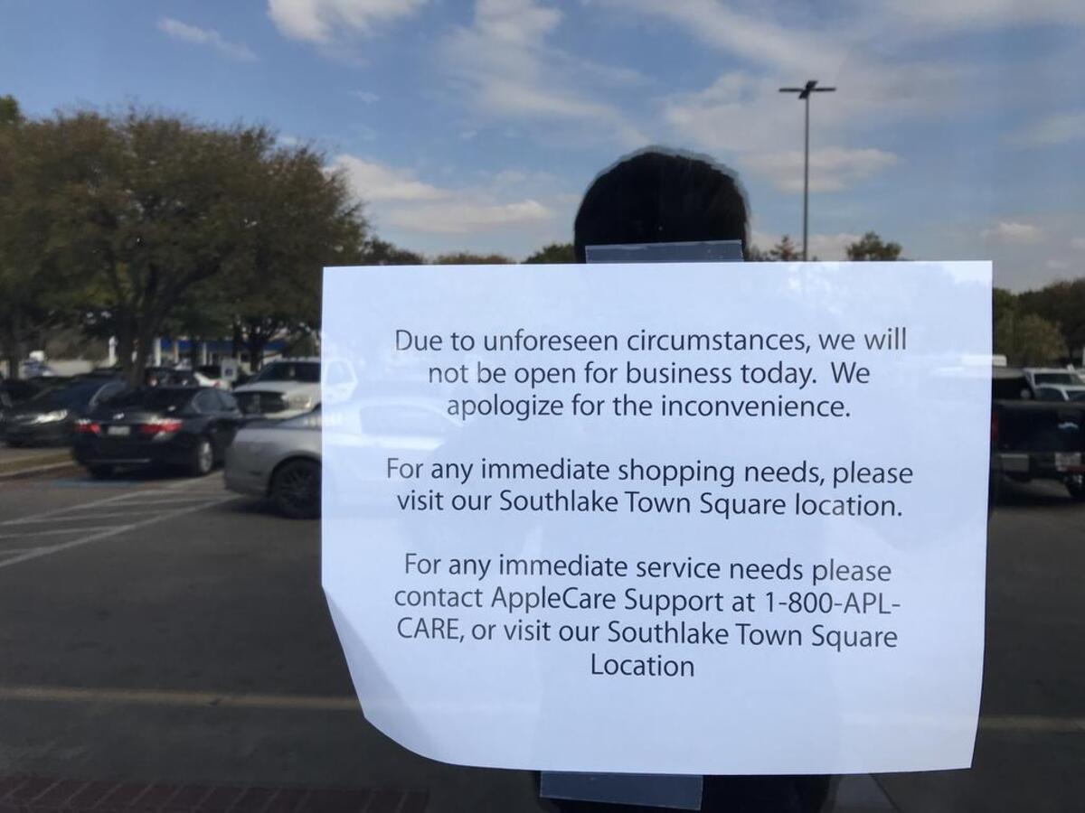 Apple customers at the University Park Village store in Fort Worth were greeted by sign Friday telling them the store was closed.