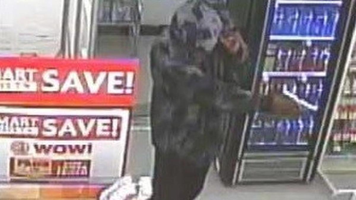 Two bandits are linked to at least nine holdups in Fort Worth since April 14, Fort Worth police said. One suspect goes inside to rob a business while another is a driver. A surveillance camera captured a photograph of this suspect holding a handgun during one of the recent robberies.