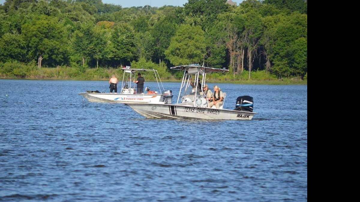 
Authorities search for the body of a missing 20-year-old fisherman at Sunshine Lake Thursday.
