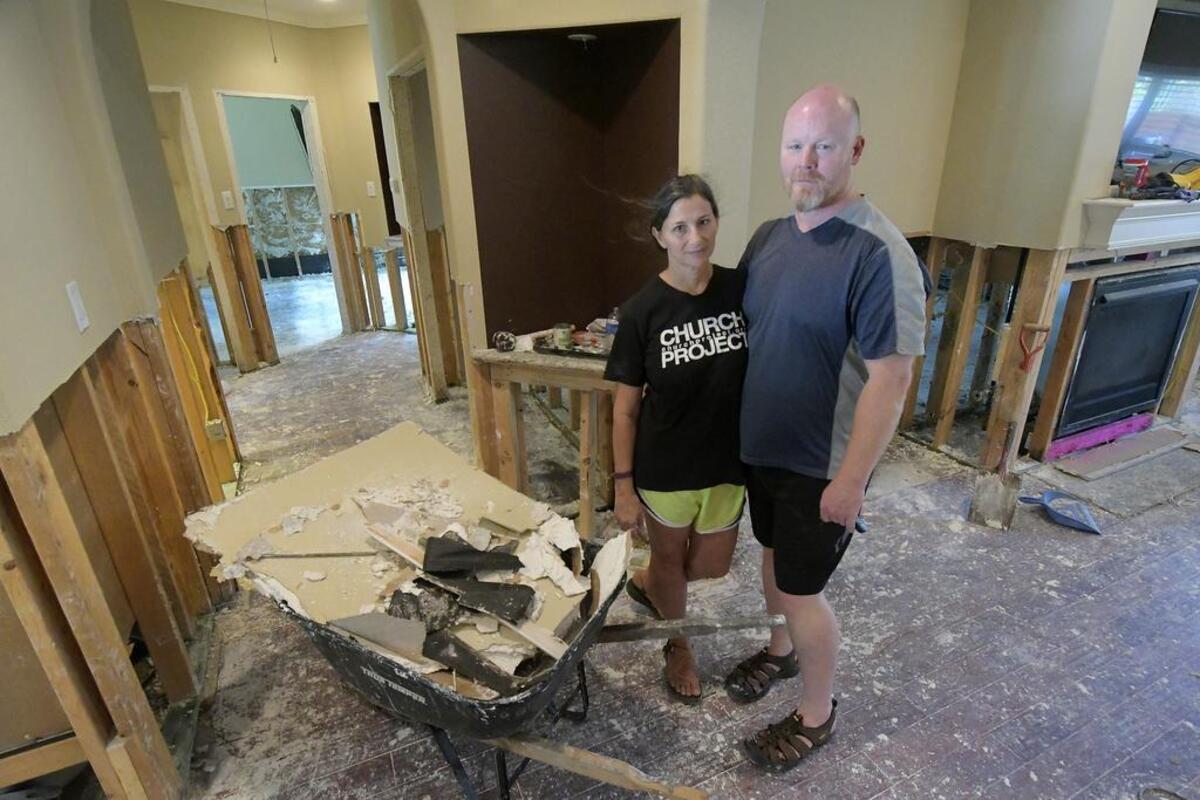 Scott Stidham and wife Nina said the flood destroyed all of their furniture and appliances in their River Plantation home in Conroe.