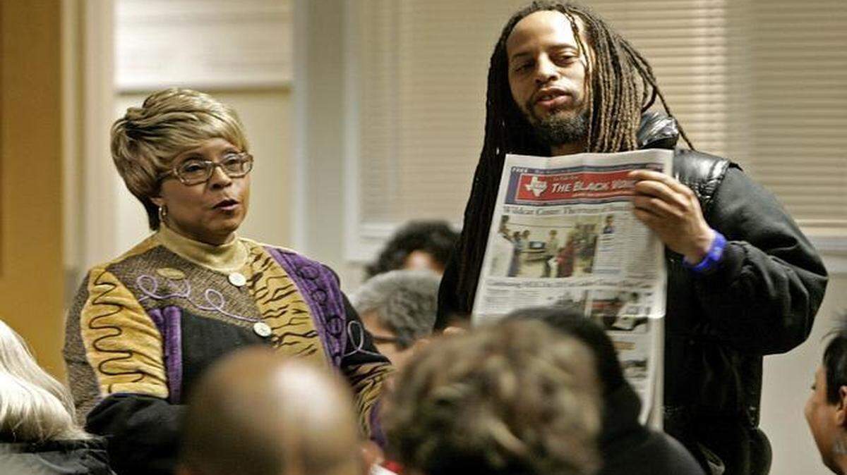 
Fort Worth City Councilwomen Gyna Bivens listens as Jonathan Morrison speaks at a meeting about children’s safety on Thursday, Feb. 5, 2015. Morrison is holding a copy of The Black Voice.
