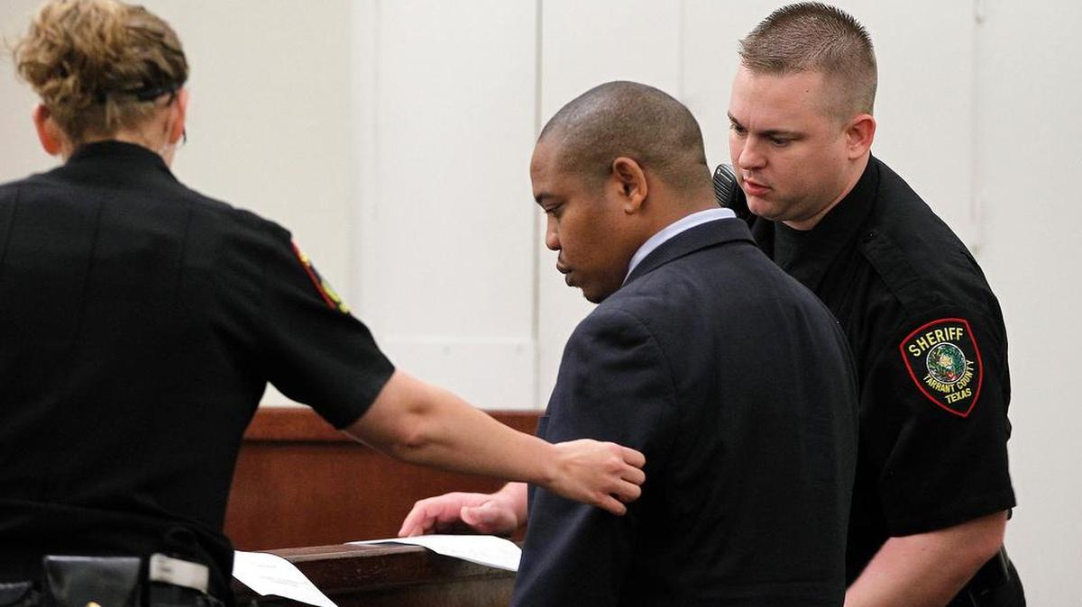 Declois Beacham is taken into custody after being found guilty during his trial in Fort Worth on Thursday, May 12, 2016.