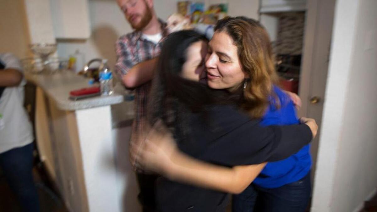 Rosa Maria Ortega hugs her daughter Gracie Garza shortly after being released from jail on an appeal bond in early March.
