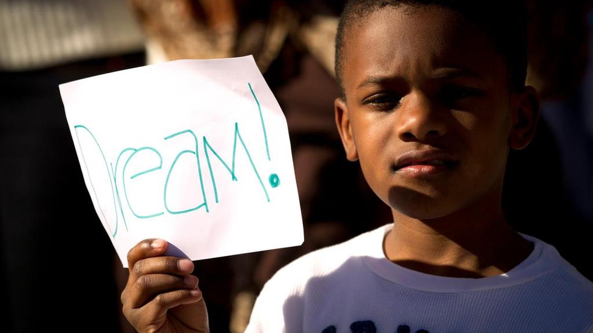 Kerrington Barnes watched the Fort Worth Martin Luther King Jr. Day Parade last year.