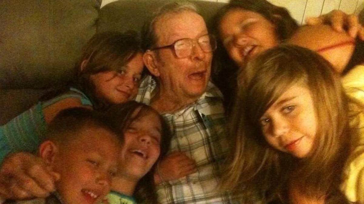 Henry Sawyer surrounded by some of his great grandchildren on Father's Day.
