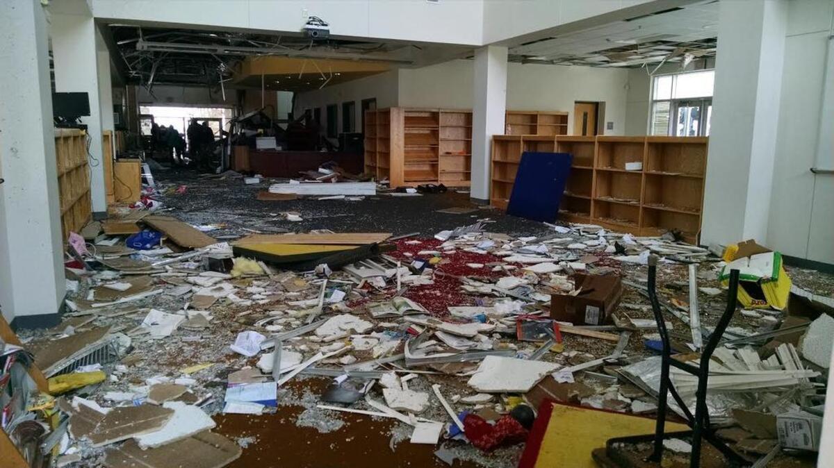 Donald T. Shields Elementary School in Glenn Heights was one of the almost 1,000 structures damaged by the tornadoes that tore through North Texas on Saturday night. Officials estimated that the storms caused $1.2 billion damage and that figure could increase.