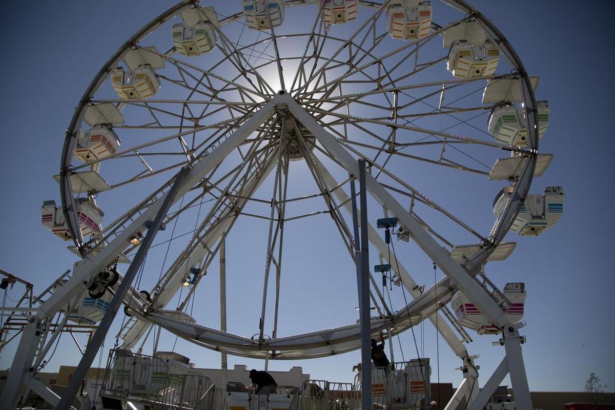 Preparations are underway for Friday’s grand opening of the new Tanger Outlets Fort Worth mall near I-35W and Texas 114, not far from Texas Motor Speedway on Thursday. A Ferris wheel is one of the attractions.