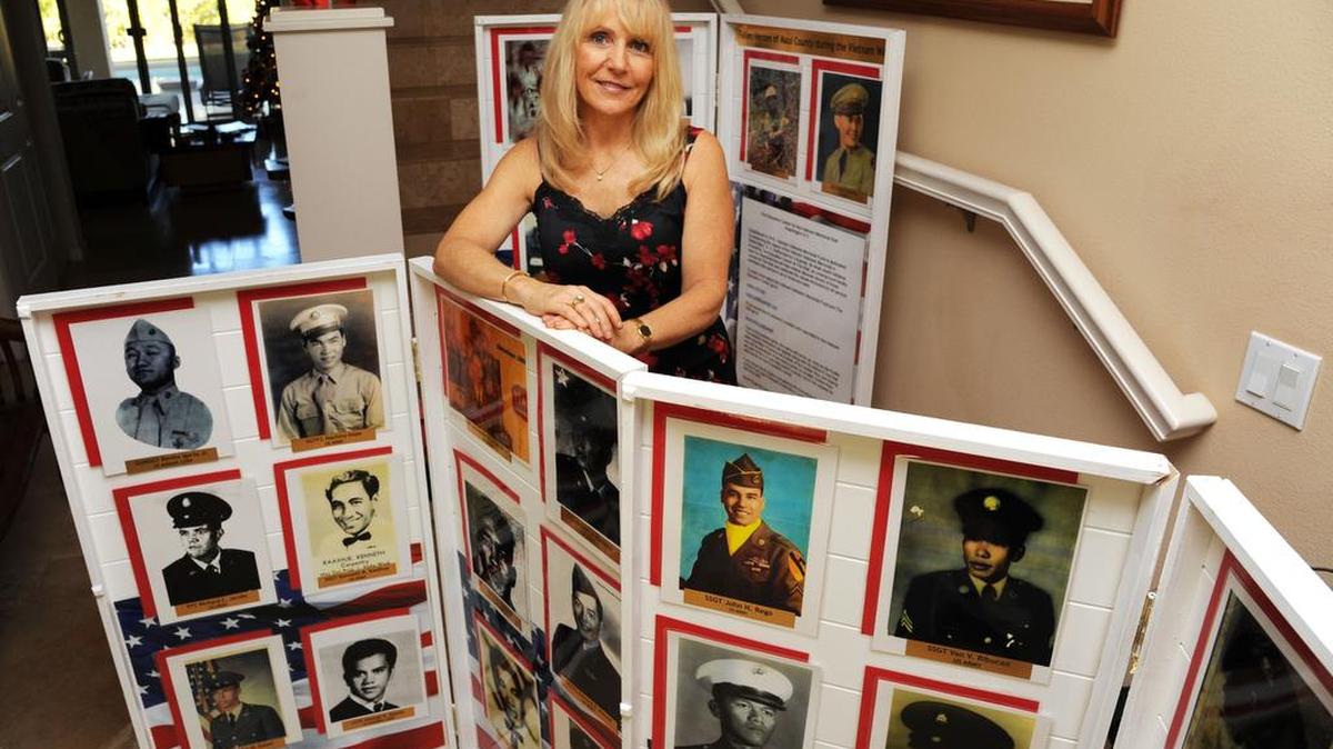 Janna Hoehn spends countless hours seeking photos of those who died in Vietnam, so a photograph can be attached to their name.