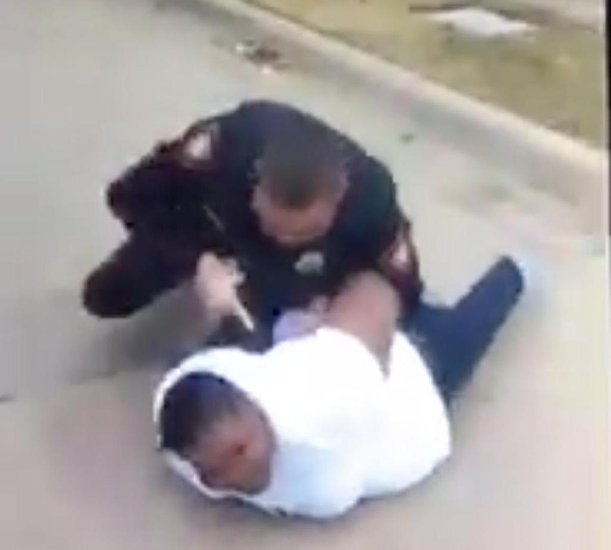 Jacqueline Craig is taken down and handcuffed by a Fort Worth police officer, Taser drawn, in this frame grab from video taken by Porsha Craver.