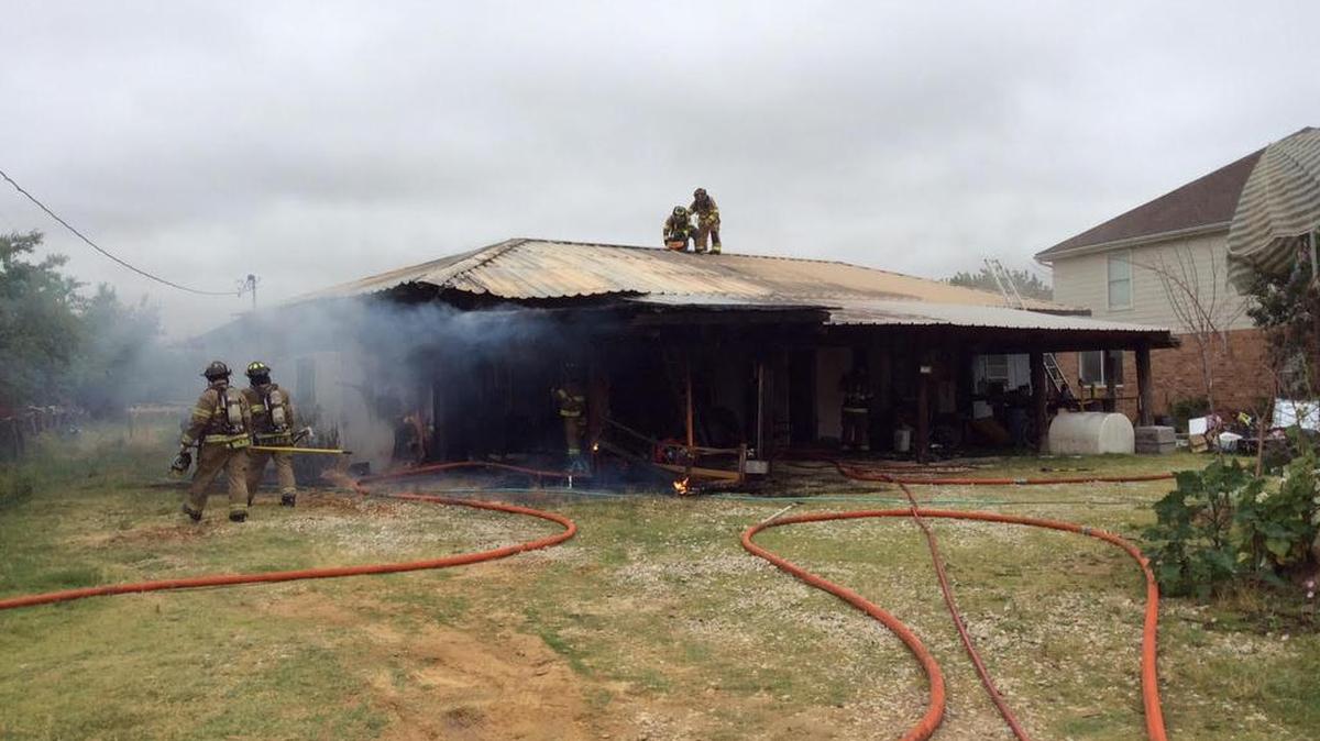 Firefighters battle heavy blaze early Saturday in north Fort Worth.