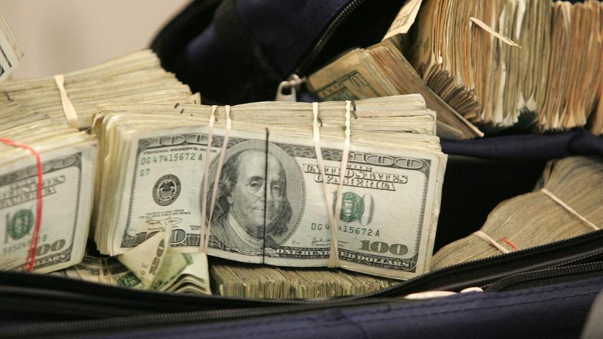 Almost $58,000 in cash was found in an air bag that led to the arrest of a cocaine trafficker in Fort Worth.