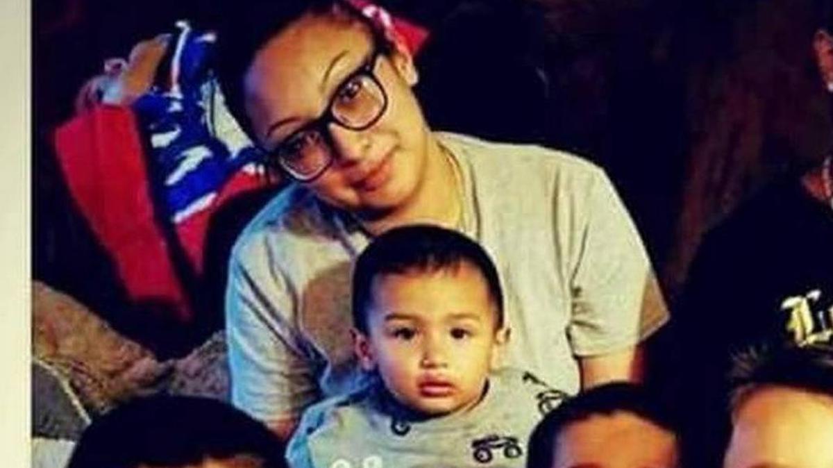 The victim, Victoria Deleon, in a photograph with her children