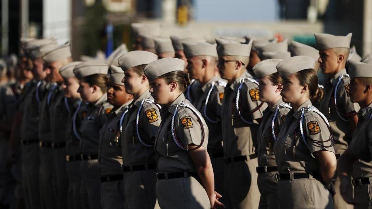 
Texas A&M University Corps of Cadets prepares to march through downtown Fort Worth on Saturday with the Texas A&M Aggie Band, leading up to the game against Arkansas at AT&T Stadium.
