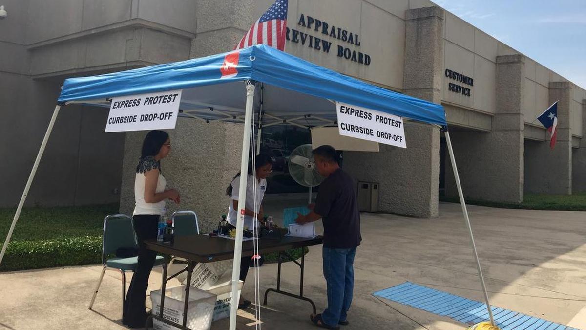 Homeowners wanting to protest their tax bills in 2016 could do so curbside outside the Tarrant Appraisal District.