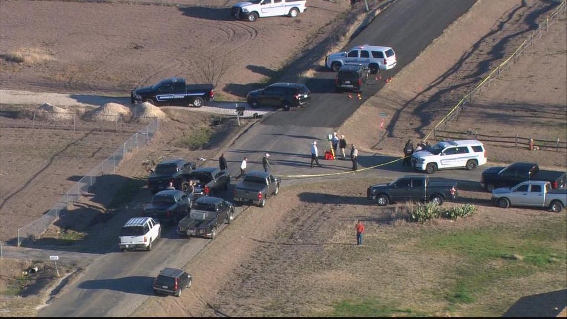 Authorities stage near a house in the 4000 block of Vista Ridge Lane in Alvarado on Jan. 27. Nathan Bailey was later killed in a shootout.
