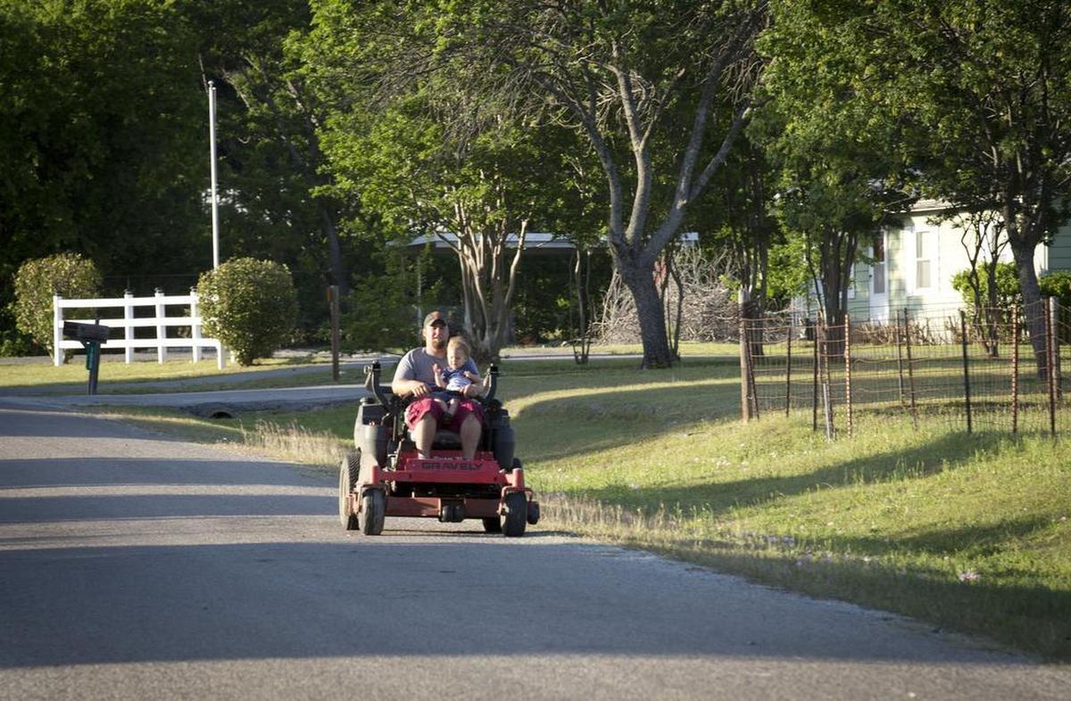 A lawnmower goes for a spin in Sanctuary, where there’s not a lot of traffic on the town’s roads.