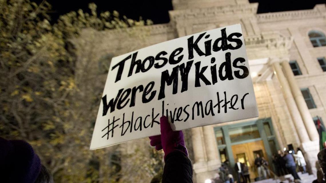 A crowd gathered to protest against the Fort Worth police at the Tarrant County Courthouse in December.