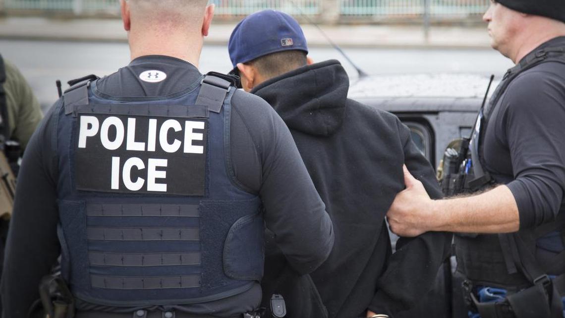 Immigration and Customs Enforcement agents make an arrest in Los Angeles in a February file photo. ICE agents detained 26 undocumented parolees reporting for community service Sunday morning at a Tarrant County facility on Cold Springs Road.