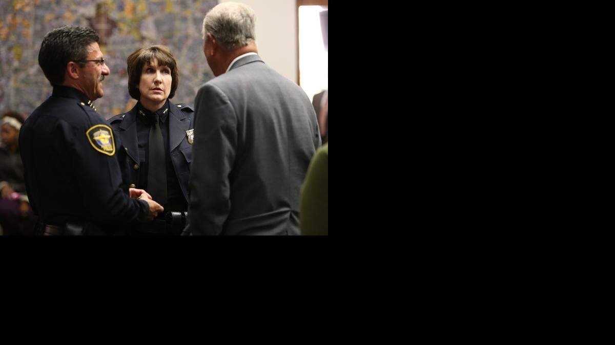 
Fort Worth Police Chief Jeff Halstead, Deputy Chief Rhonda Robertson and City Councilman W.B. “Zim“ Zimmerman talk before the pre-council meeting on Nov. 11. After six years as chief, Fort Worth police chief Jeff Halstead announced his intention to retire at the that meeting. 


