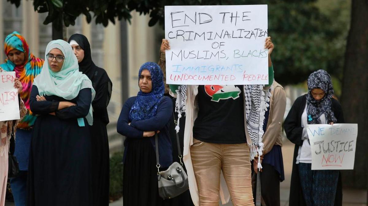 Protesters in front of the federal courthouse in Fort Worth Wednesday, March 30, 2016, are supporters of Dr. Aafia Siddiqui who is serving a sentence at the Federal Medical Center, Carswell.