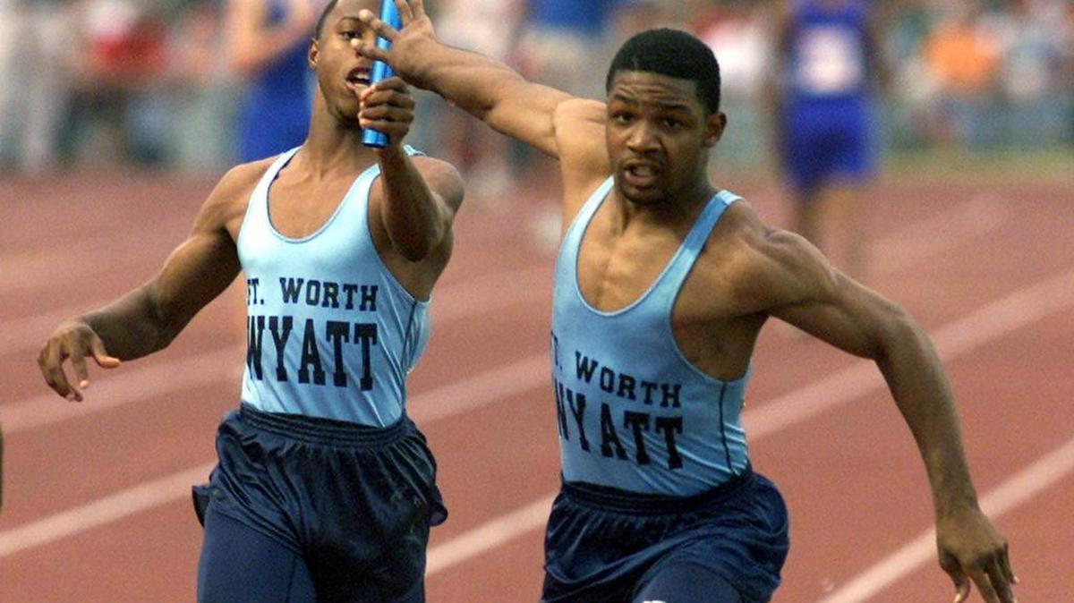 O.D. Wyatt High School's Darrent Williams (right) takes the pass of the baton from teammate Chester Johnson (left) at the UIL State Track Meet in Austin in May 2000. Both men are now dead, murdered 8 years apart.