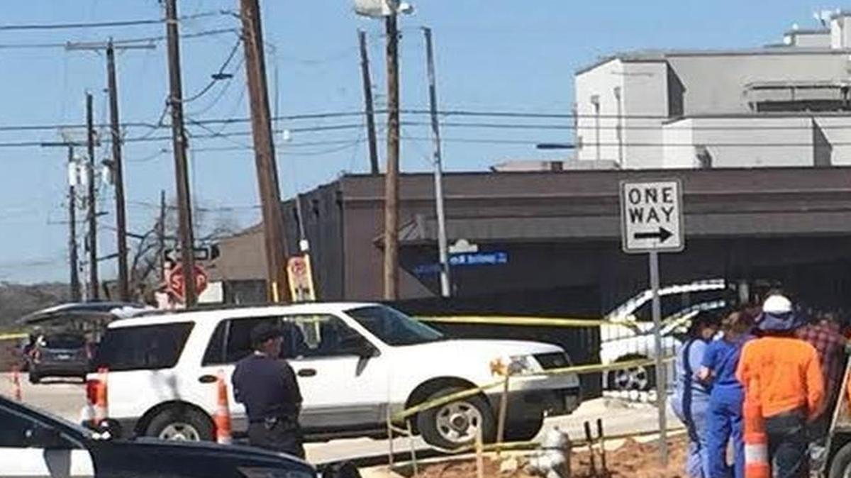 Fort Worth police investigate at a downtown corner Tuesday after construction workers found what appeared to be human remains.