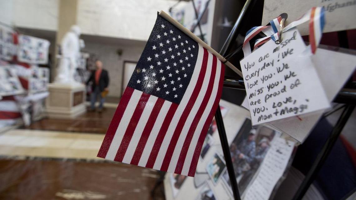
The display at Greenwood Mausoleum Independence Chapel features portraits of nearly 600 Texans who have died in military service since 2003. 
