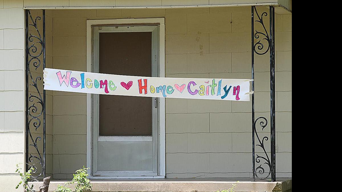 
A banner welcomes home Caitlyn Williams in the 1100 of block Wade Hampton in Benbrook on Wednesday
