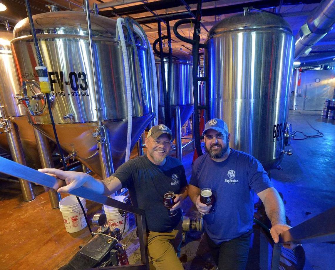 HopFusion Ale Works co-owners Macy Moore, left, and Matt Hill at their brewery, which is near South Main Street.