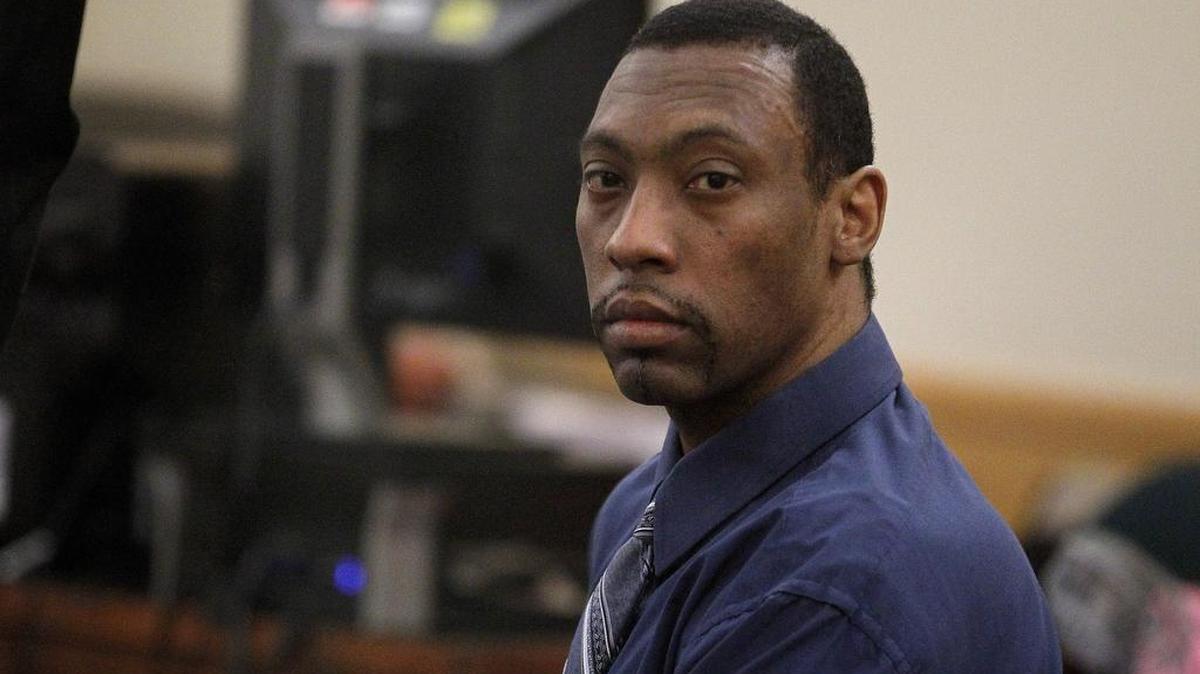 Michael Henderson is accused of killing a homeless man to steal his identity.