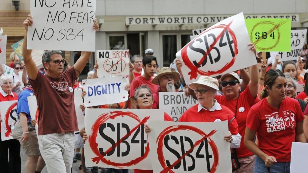 A crowd filled the streets downtown on Aug. 1 to protest the so-called “sanctuary cities” bill.