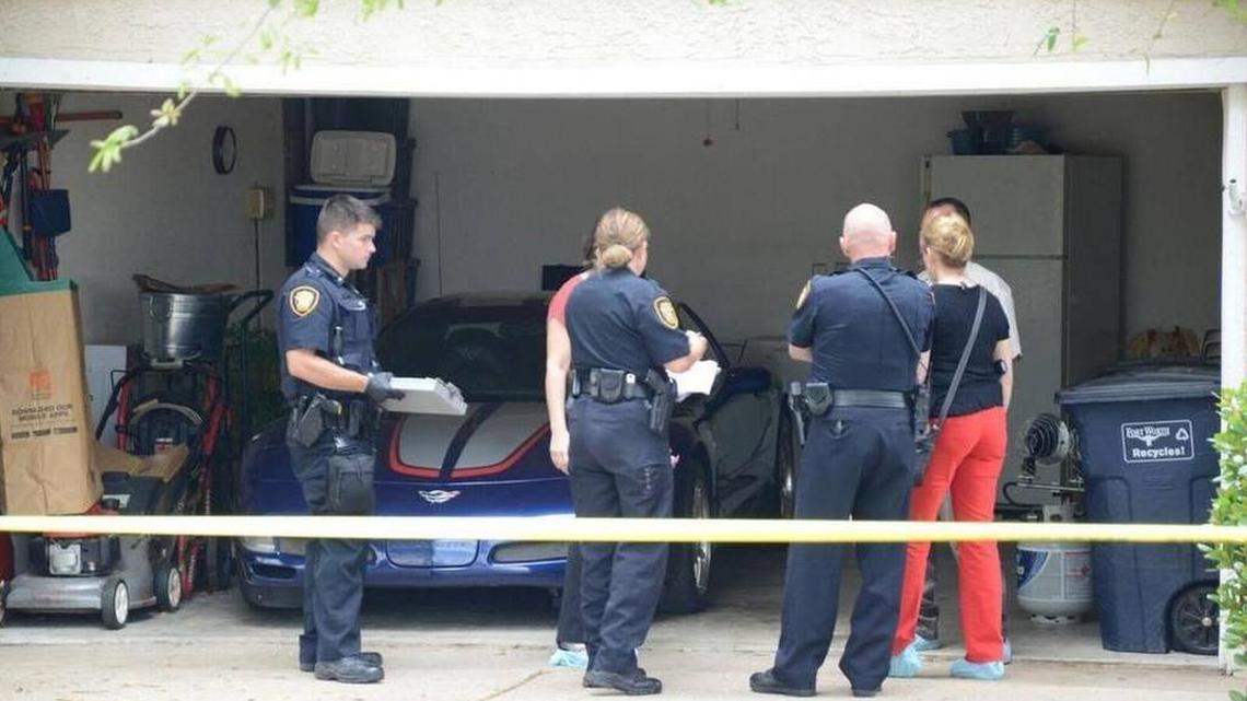Fort Worth police officers at the scene of the home invasion on Cool Spring Drive on March 28.