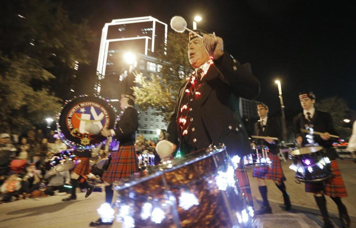 XTO has sponsored the downtown Parade of Lights for the past three years. Here, members of the Fort Worth Scottish Pipes & Drums perform last November during the parade.