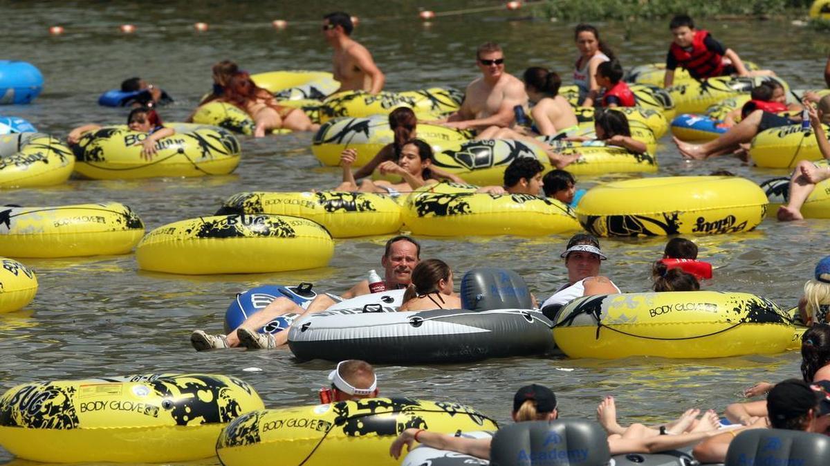 
Tubers float in the Trinity River on July 4, 2014, at Panther Island Pavilion.
